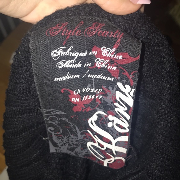 Black knit sweater. Brand is Karv, worn gently, priced at 110$. - Picture 5 of 5